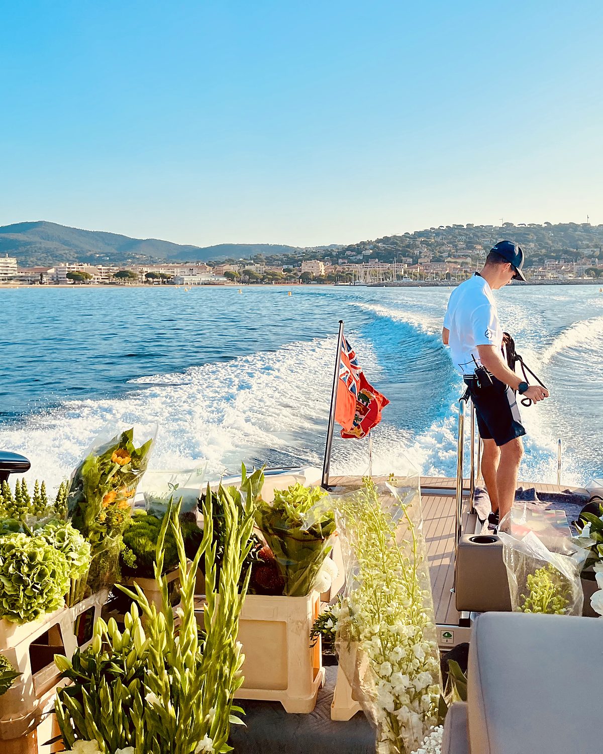 Delivering flowers by tender out to a yacht at anchor